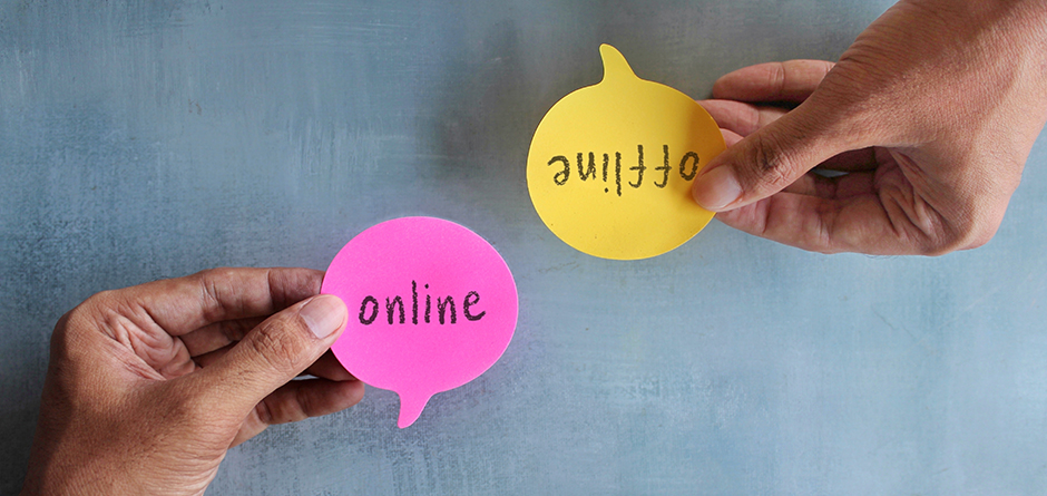 TopViewImageOfHandHoldingSpeechBubbleWithText | Evok Advertising Social First Marketing in 2025